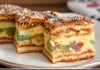 Domino torta sa orasima, grožđicama i džemom od kajsija – starinski kolač bogatog ukusa